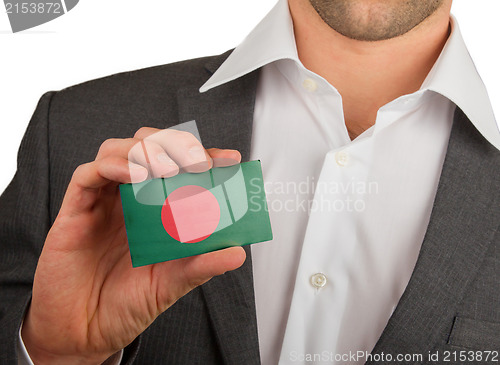 Image of Businessman is holding a business card, Bangladesh