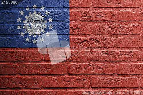 Image of Brick wall with a painting of a flag, Myanmar