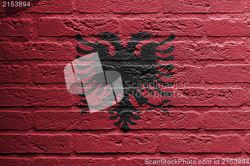 Image of Brick wall with a painting of a flag, Albania