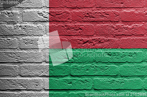 Image of Brick wall with a painting of a flag, Madagascar