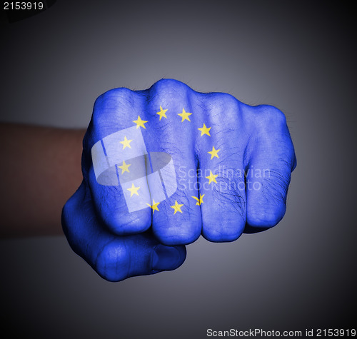 Image of Fist punching, EU flag pattern