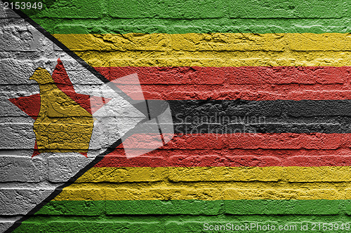 Image of Brick wall with a painting of a flag,  Zimbabwe