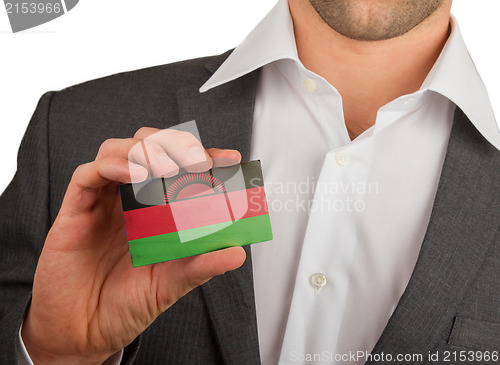Image of Businessman is holding a business card, bol, visiting, white, wo