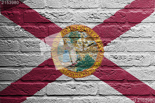 Image of Brick wall with a painting of a flag, Florida
