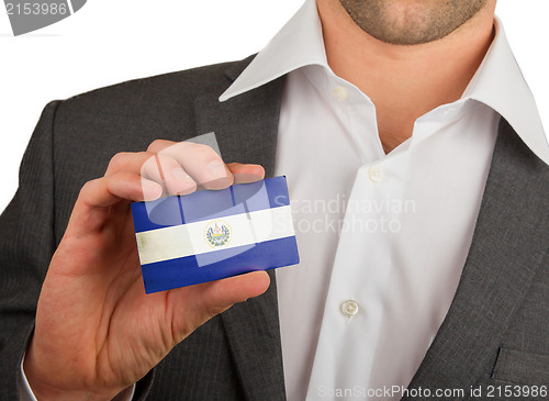 Image of Businessman is holding a business card, El Salvador