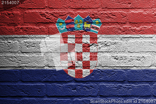 Image of Brick wall with a painting of a flag, Croatia