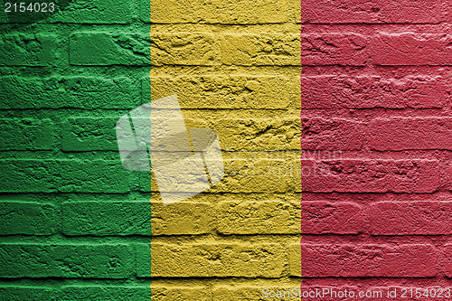 Image of Brick wall with a painting of a flag, Mali