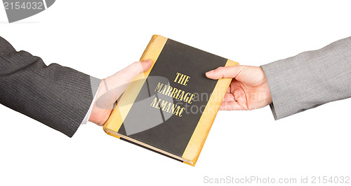 Image of Man and woman holding a marriage almanac