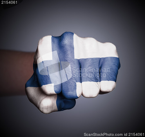 Image of Front view of punching fist on gray background