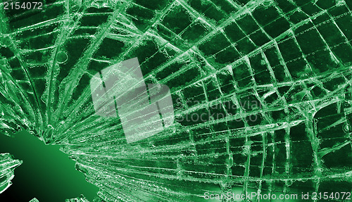 Image of Broken glass or ice with a flag, Libya