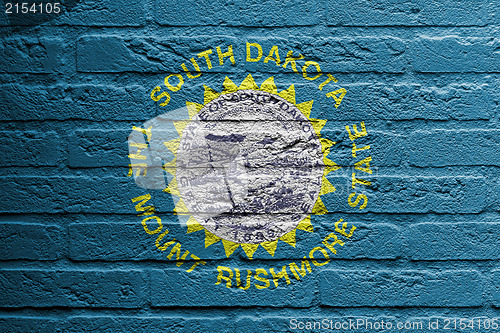 Image of Brick wall with a painting of a flag, South Dakota