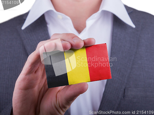 Image of Businessman showing card, matte paper effect