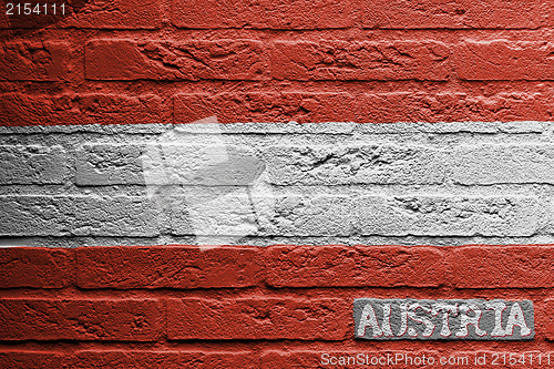 Image of Brick wall with a painting of a flag, Austria