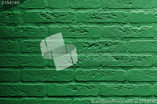 Image of Brick wall with a painting of a flag, Libya