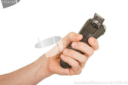 Image of Hand holding an electric shaver 