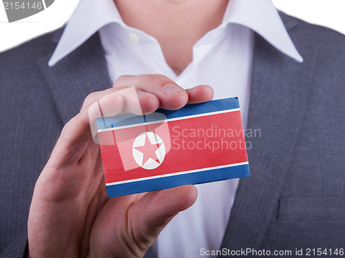 Image of Businessman showing card, matte paper effect