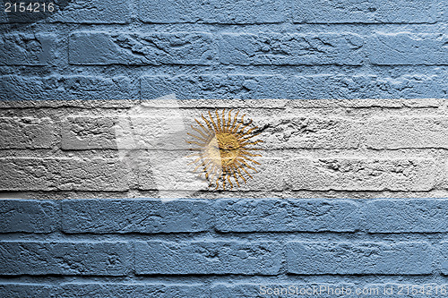 Image of Brick wall with a painting of a flag, Argentina