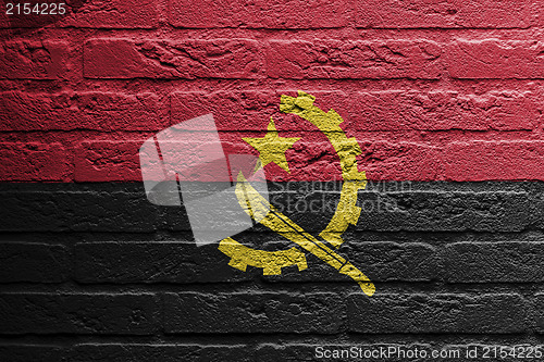 Image of Brick wall with a painting of a flag,  Angola