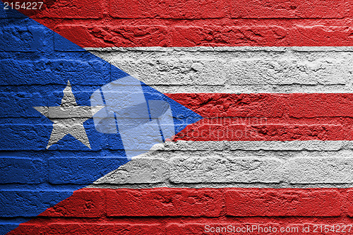 Image of Brick wall with a painting of a flag, Puerto Rico