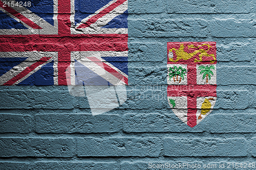 Image of Brick wall with a painting of a flag, Fiji