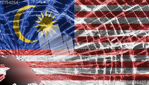 Image of Broken glass or ice with a flag, Malaysia