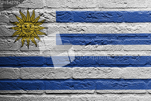 Image of Brick wall with a painting of a flag, Uruguay