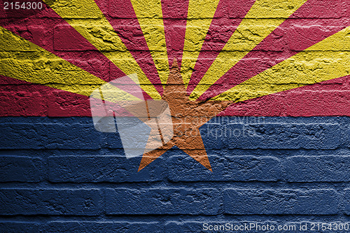 Image of Brick wall with a painting of a flag, Florida