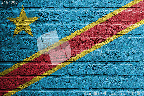 Image of Brick wall with a painting of a flag, The Democratic Republic of