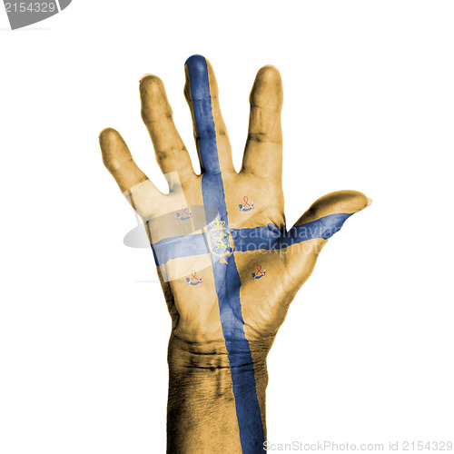 Image of Hand of an old woman, wrapped with a pattern of the banner of th