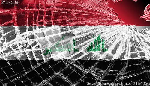 Image of Broken glass or ice with a flag, Iraq