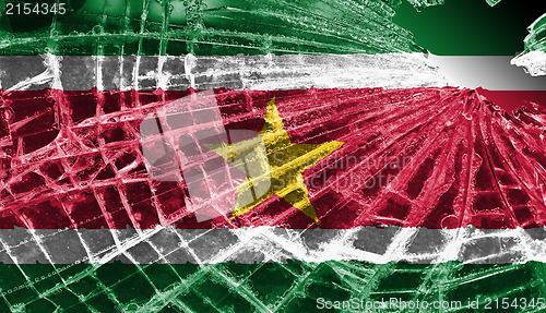 Image of Broken glass or ice with a flag, Suriname