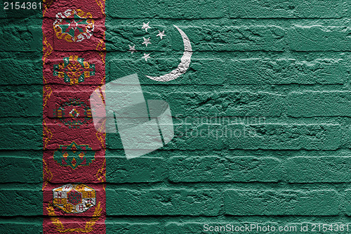 Image of Brick wall with a painting of a flag, Turkmenistan