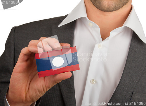 Image of Businessman is holding a business card, Laos