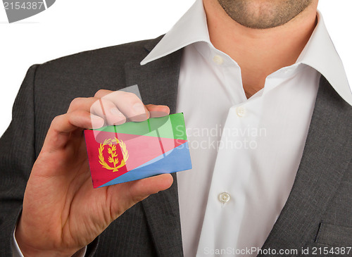 Image of Businessman is holding a business card, Eritrea