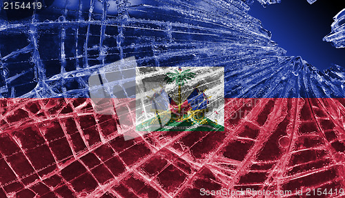 Image of Broken glass or ice with a flag, Haiti
