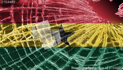 Image of Broken glass or ice with a flag, Ghana