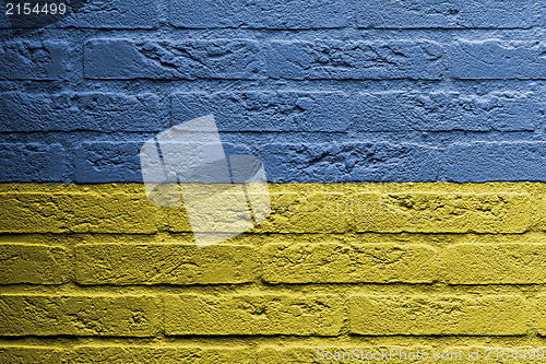 Image of Brick wall with a painting of a flag, Ukraine