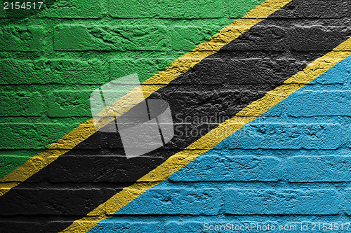 Image of Brick wall with a painting of a flag, Tanzania
