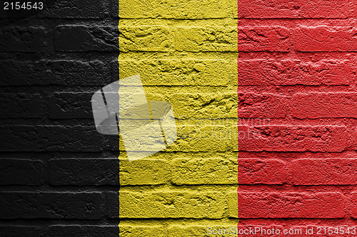 Image of Brick wall with a painting of a flag, Belgium