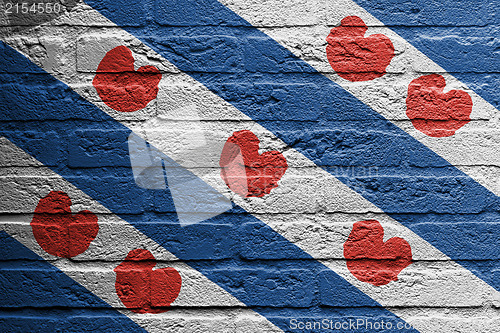 Image of Brick wall with a painting of a flag, Friesland