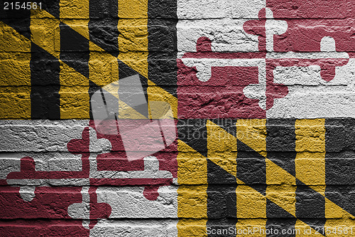 Image of Brick wall with a painting of a flag, Maryland