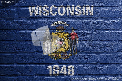 Image of Brick wall with a painting of a flag, Wisconsin