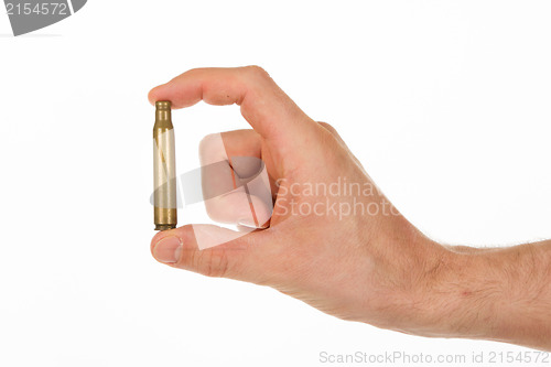 Image of Hand holding an empty cartridge