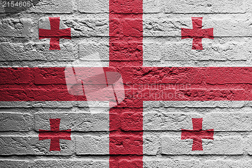 Image of Brick wall with a painting of a flag, Georgia