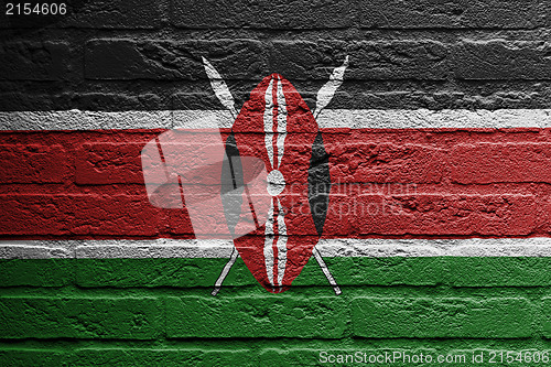 Image of Brick wall with a painting of a flag, 