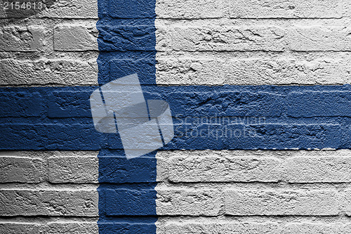 Image of Brick wall with a painting of a flag, Finland