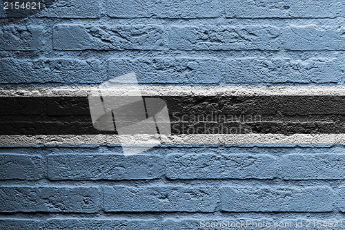 Image of Brick wall with a painting of a flag, Botswana