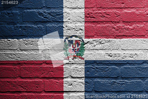Image of Brick wall with a painting of a flag, the dominican republic