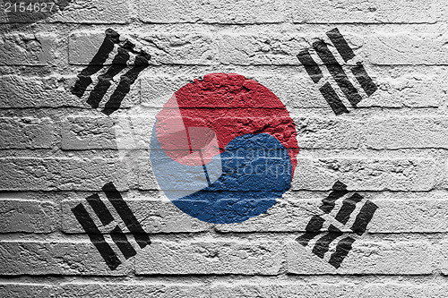 Image of Brick wall with a painting of a flag, South Korea