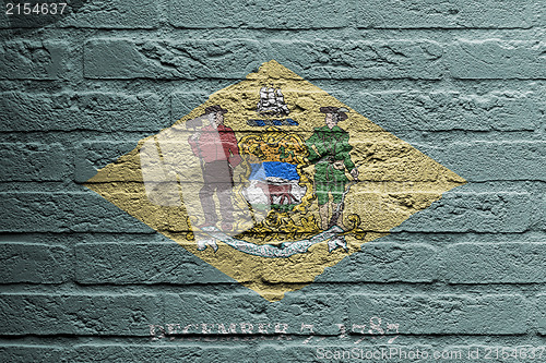 Image of Brick wall with a painting of a flag, Delaware